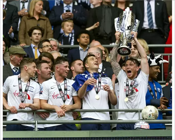 PNE Players Lift The Play-Off Final trophy At Wembley