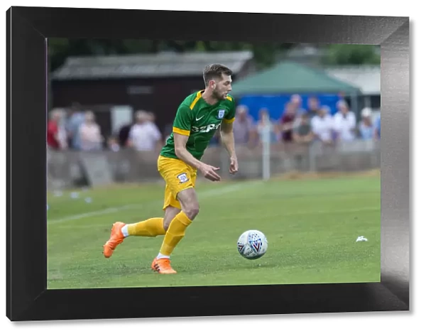 Preston North End's Tom Barkhuizen in Action against Bamber Bridge in Green Kit (July 7, 2018)