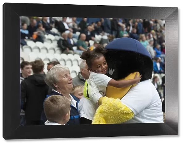 Deepdale Duck And Young Fan Share A Hug