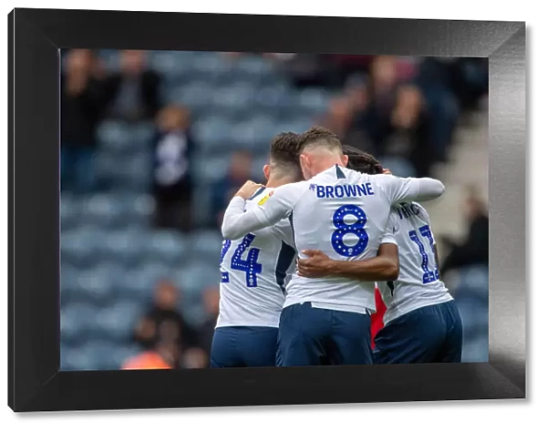 Triumphant Threesome: Maguire, Browne, and Johnson's Euphoric Goal Celebration vs Barnsley (Preston North End FC)