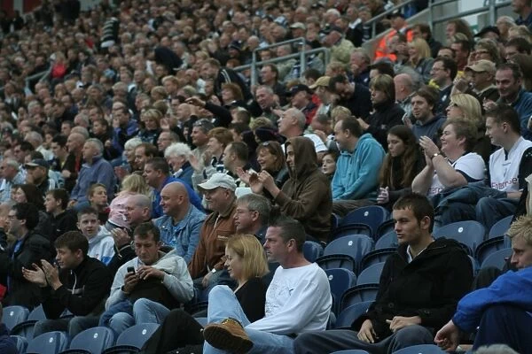 Bristol City Fans in Action at Deepdale: A Preston North End Football Club Matchday Experience