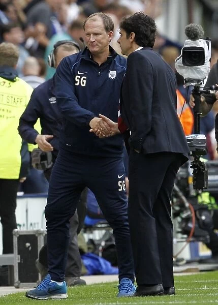 Championship Rival Managers Simon Grayson and Aitor Karanka Share a Respectful Handshake After Preston North End vs Middlesbrough Match