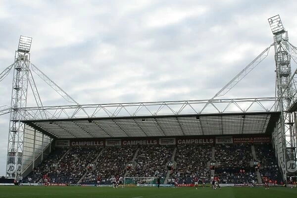 Football Rivalry Unfolds: PNE vs. Bristol City - Passionate Supporters in Action at Deepdale