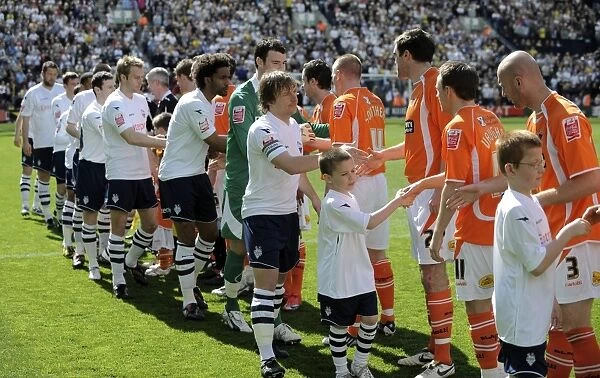 Friendly Rivalry: Preston North End and Blackpool's Pre-Championship Handshake (08 / 09)