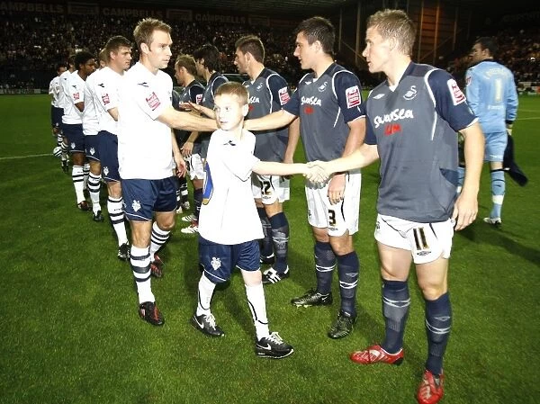 Friendly Rivalry: Preston North End vs Swansea City - Championship Handshake Before Kickoff (08 / 09)