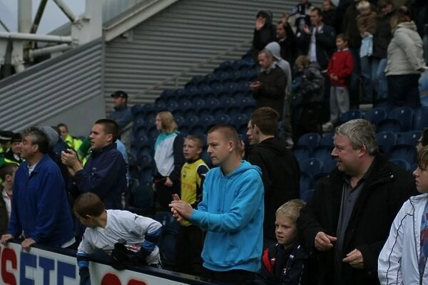 A Sea of Passion: Preston North End FC Fans Unwavering Support (Photos of Fans)