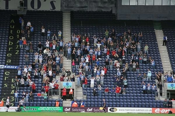 A Sea of Passion: Preston North End FC Supporters in Action against Colchester United (25-08-07)