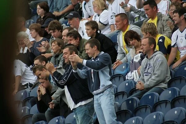 A Sea of Passion: Unforgettable Moments with Preston North End Football Club Fans - An Image Collection