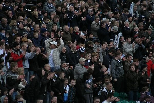 A Sea of Passion: Unwavering Support of Preston North End Football Club Fans - Photos of Devoted Fans