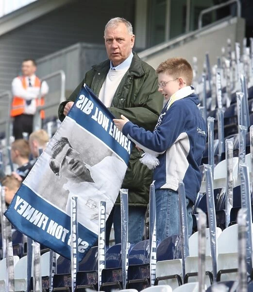 Sea of Sir Tom Finney Flags: An Emotional Tribute by Preston North End Fans during the Championship Match against Blackpool (2009)