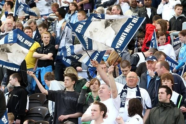 Sea of Sir Tom Finney Flags: Preston North End Fans Tribute at Championship Match vs. Blackpool (08 / 09)
