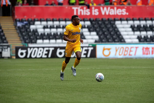SkyBet Championship Showdown: Darnell Fisher's Double Performance in Yellow - Swansea City vs Preston North End
