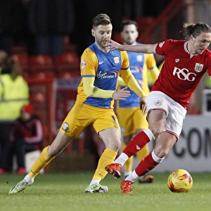 Clash between Luke Ayling and Paul Gallagher in Sky Bet Championship Match: Bristol City vs. Preston North End