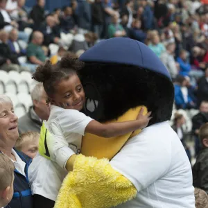 Deepdale Duck And Young Fan Share A Hug