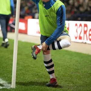 Ethan Walker Warms Up Pitch side