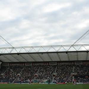 Football Rivalry Unfolds: PNE vs. Bristol City - Passionate Supporters in Action at Deepdale