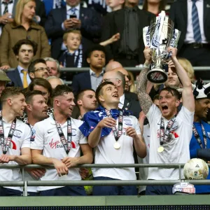 PNE Players Lift The Play-Off Final trophy At Wembley