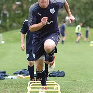Preston North End Football Club: Uniting Families and Community - 2011 Centre of Excellence Training Day