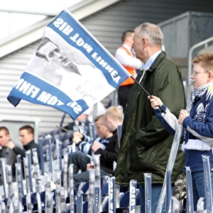 Preston North End vs Blackpool: Fans Honor Sir Tom Finney with Flag Wave at Deepdale (08/09)