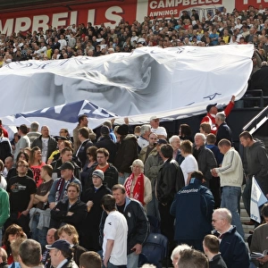 Preston North End vs Blackpool: A Sea of Scarves - Fans Honor Football Legend Sir Tom Finney at Deepdale (08/09)