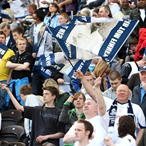 Sea of Sir Tom Finney Flags: Preston North End Fans Tribute at Championship Match vs. Blackpool (08/09)