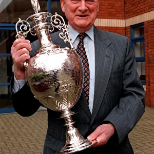 Tom Finney holds League Cup