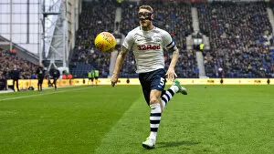 Images Dated 26th December 2018: A Masked Tom Clarke Chases The Ball At Deepdale