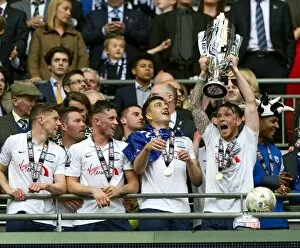 Championship Collection: PNE Players Lift The Play-Off Final trophy At Wembley