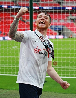 pnes joe garner celebrates promotion championship