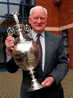 Sir Tom Finney Collection: Tom Finney holds League Cup